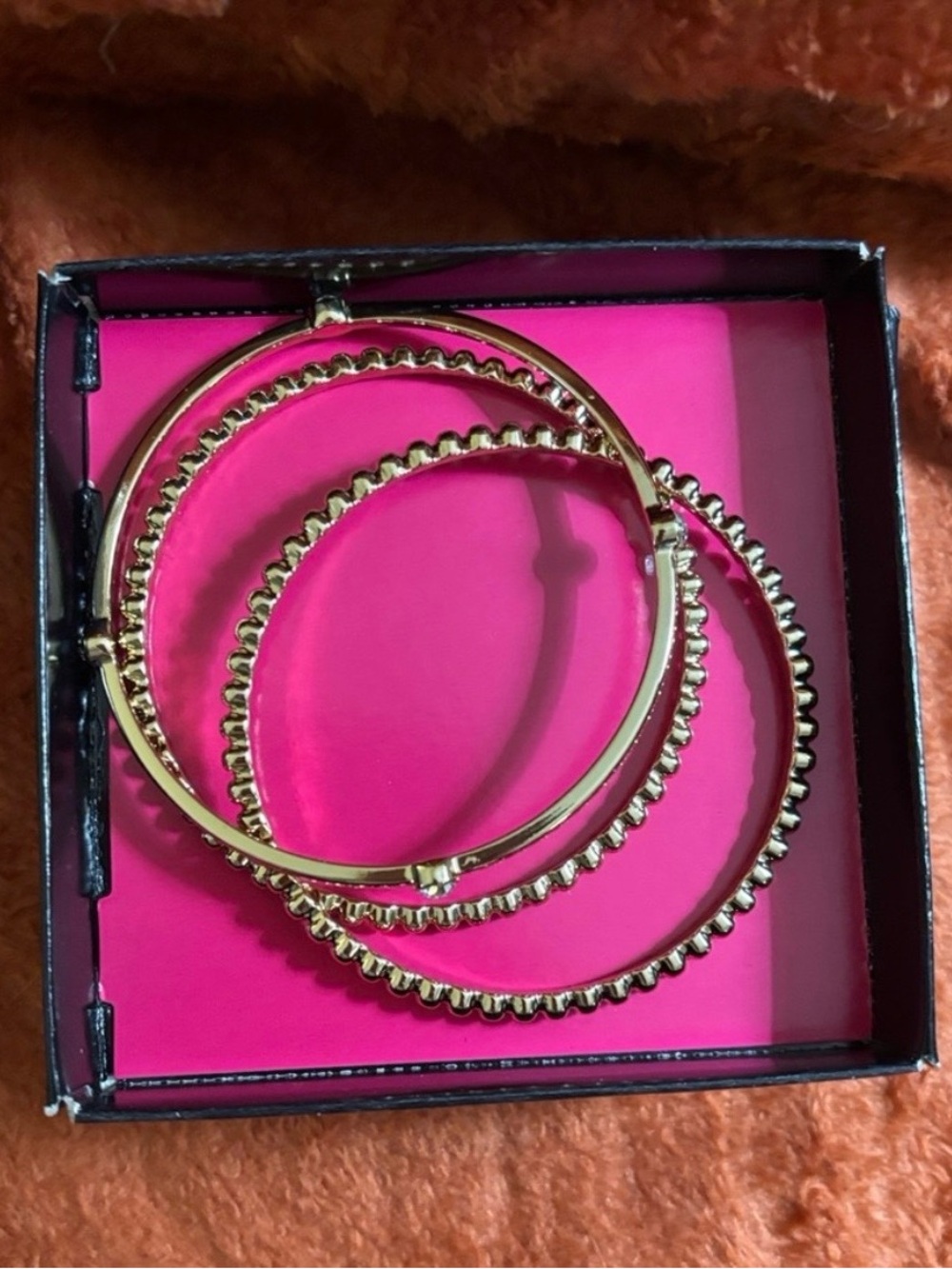 Avon Dreamy Sparkle goldtone textured bangle bracelet set.
